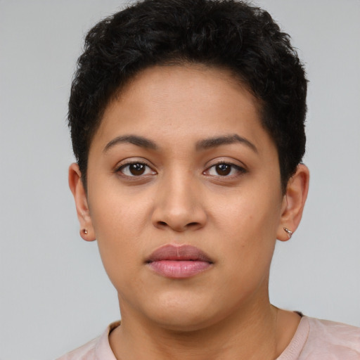 Neutral latino young-adult female with short  black hair and brown eyes