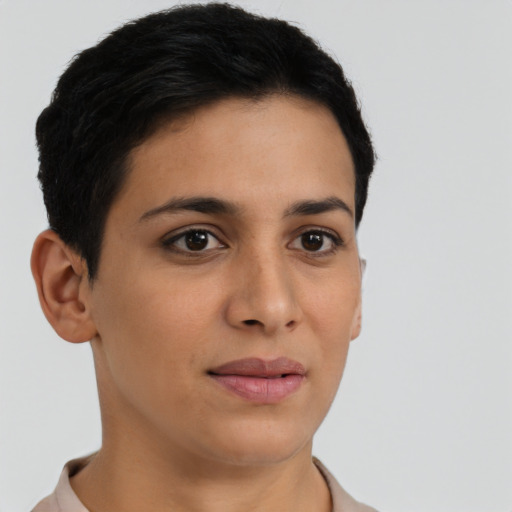 Joyful latino young-adult female with short  brown hair and brown eyes