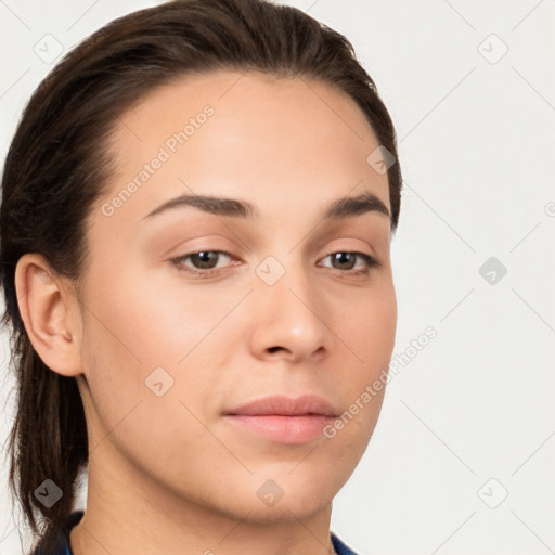 Neutral white young-adult female with long  brown hair and brown eyes