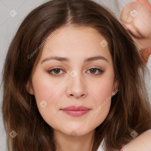 Neutral white young-adult female with long  brown hair and brown eyes