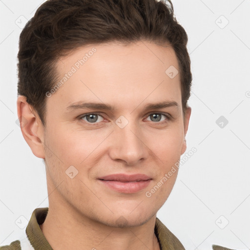 Joyful white young-adult male with short  brown hair and grey eyes