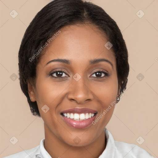 Joyful black young-adult female with short  brown hair and brown eyes