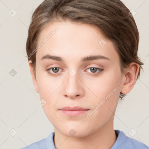 Neutral white young-adult female with short  brown hair and brown eyes