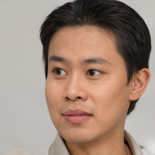Neutral asian young-adult male with short  brown hair and brown eyes