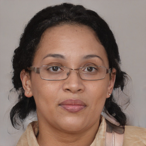 Joyful asian adult female with medium  brown hair and brown eyes