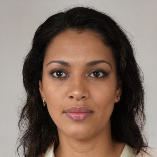 Neutral black young-adult female with medium  brown hair and brown eyes