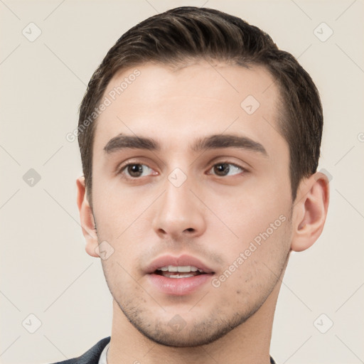 Neutral white young-adult male with short  brown hair and brown eyes