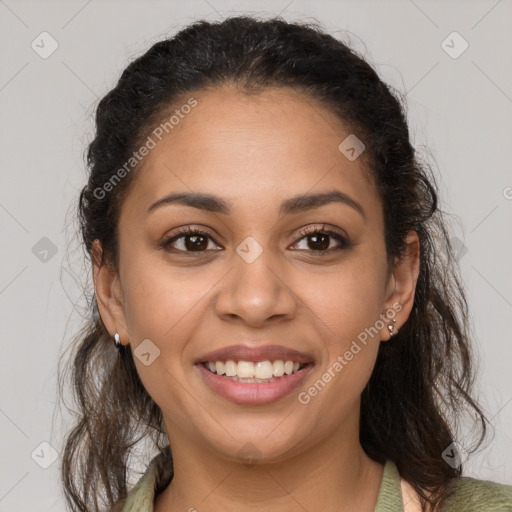 Joyful latino young-adult female with medium  brown hair and brown eyes