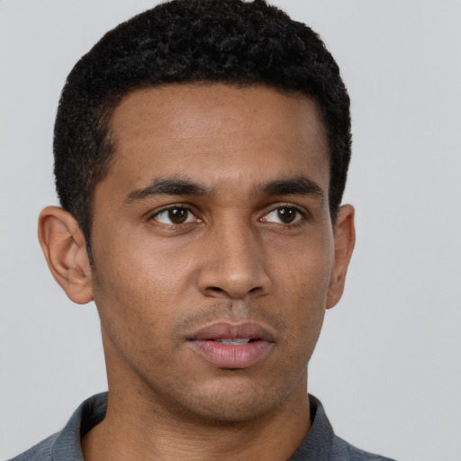 Neutral latino young-adult male with short  brown hair and brown eyes