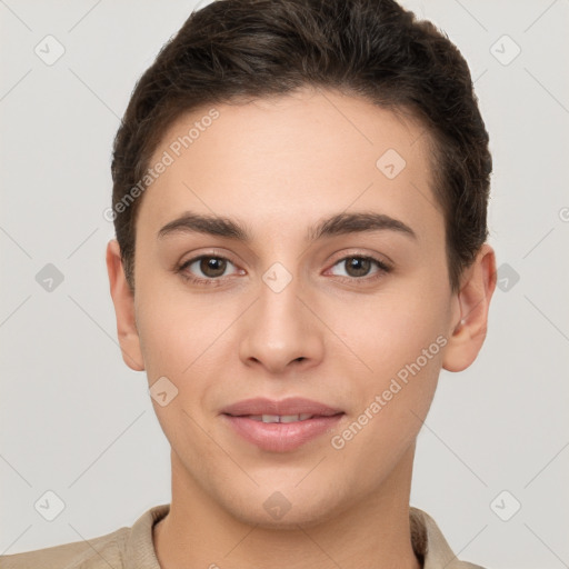 Joyful white young-adult female with short  brown hair and brown eyes