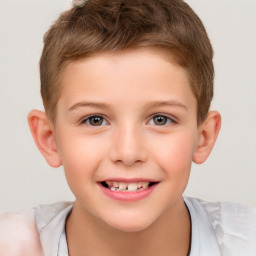 Joyful white child male with short  brown hair and brown eyes