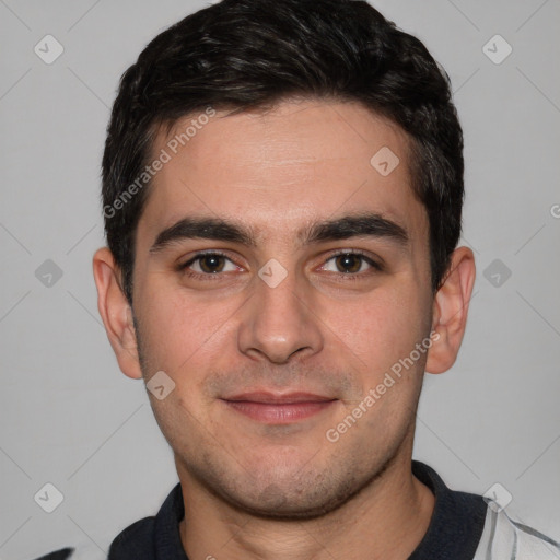 Joyful white young-adult male with short  black hair and brown eyes