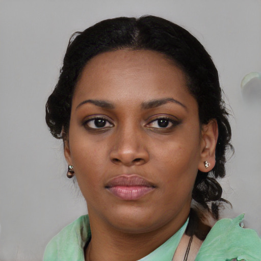 Neutral black young-adult female with medium  black hair and brown eyes