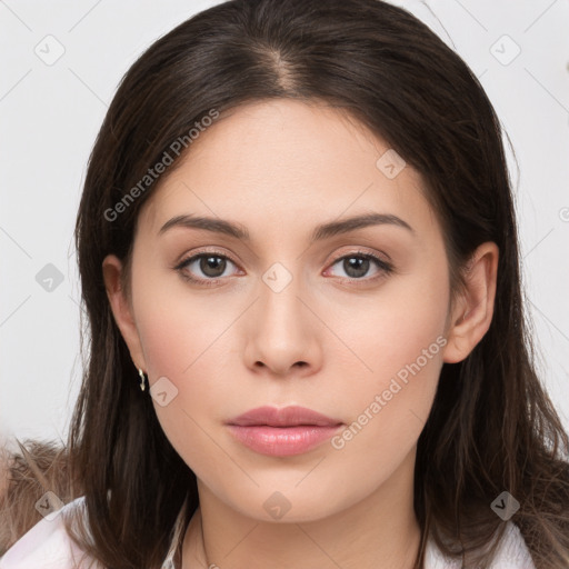 Neutral white young-adult female with long  brown hair and brown eyes