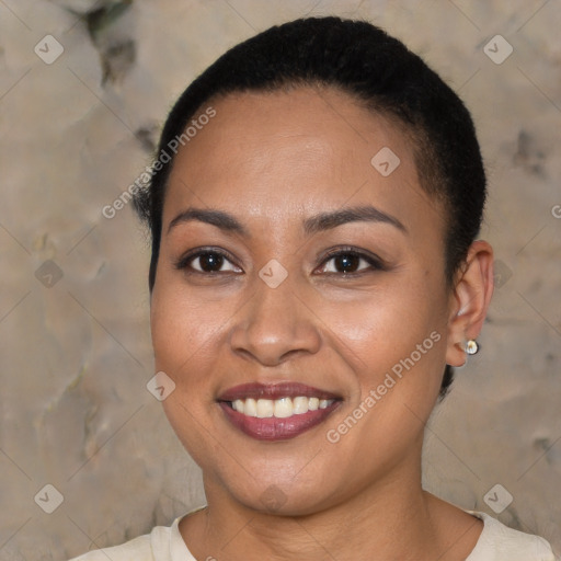 Joyful black young-adult female with short  brown hair and brown eyes