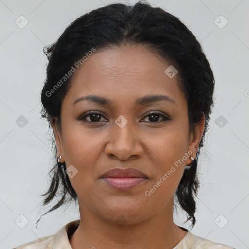 Joyful black young-adult female with medium  brown hair and brown eyes
