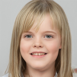 Joyful white child female with medium  brown hair and grey eyes