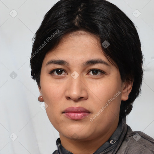 Joyful white young-adult female with short  black hair and brown eyes