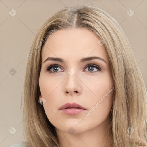 Neutral white young-adult female with long  brown hair and brown eyes