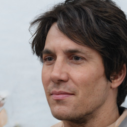 Neutral white adult male with short  brown hair and brown eyes