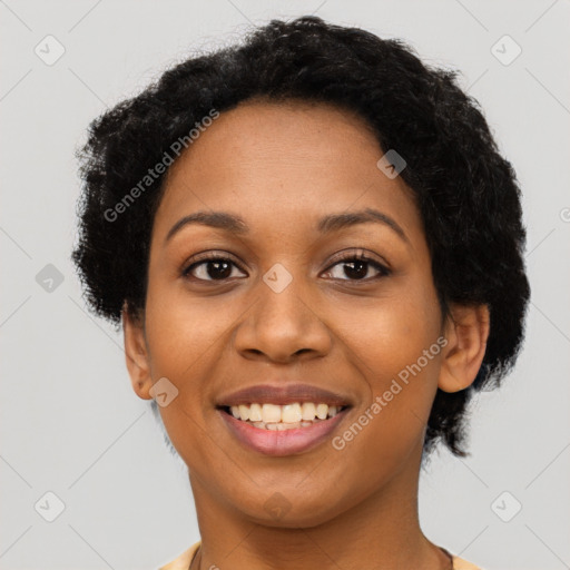 Joyful latino young-adult female with short  black hair and brown eyes