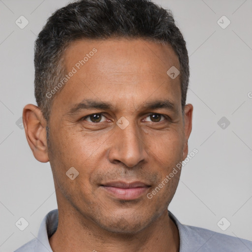 Neutral latino adult male with short  black hair and brown eyes