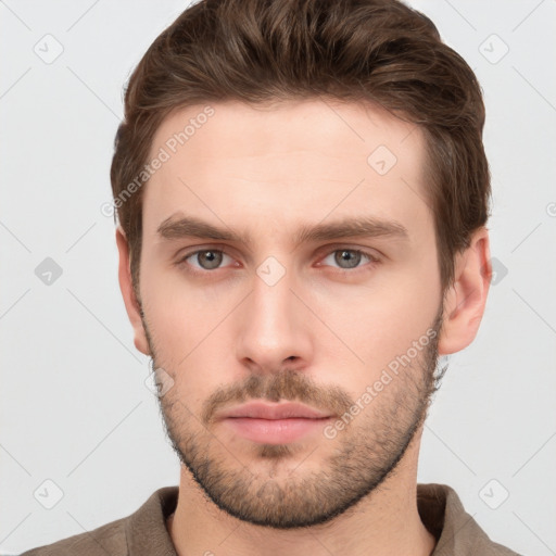 Neutral white young-adult male with short  brown hair and grey eyes