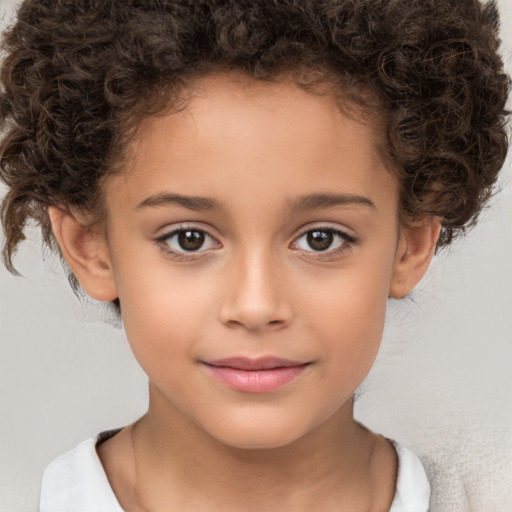 Joyful white child female with medium  brown hair and brown eyes