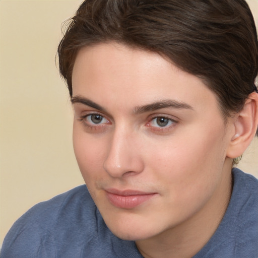 Neutral white young-adult female with short  brown hair and brown eyes