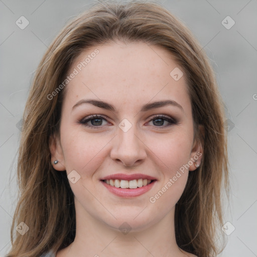 Joyful white young-adult female with long  brown hair and grey eyes