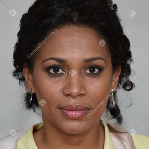 Joyful black adult female with medium  brown hair and brown eyes