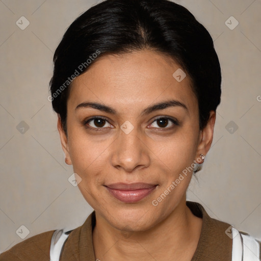 Joyful latino young-adult female with short  black hair and brown eyes