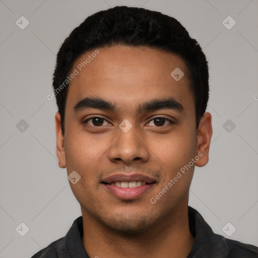 Joyful latino young-adult male with short  black hair and brown eyes