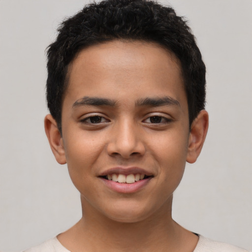 Joyful latino young-adult male with short  brown hair and brown eyes