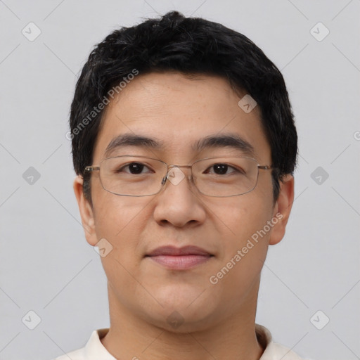 Joyful asian young-adult male with short  black hair and brown eyes