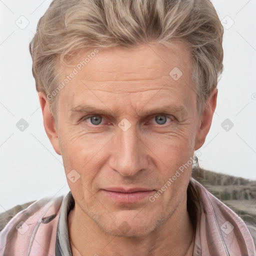 Joyful white adult male with short  brown hair and grey eyes