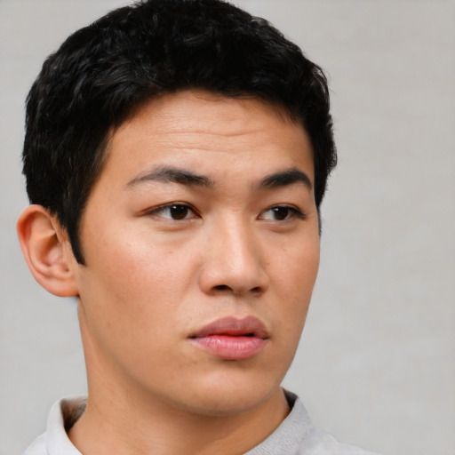 Neutral asian young-adult male with short  black hair and brown eyes
