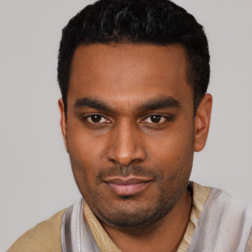 Neutral latino young-adult male with short  black hair and brown eyes