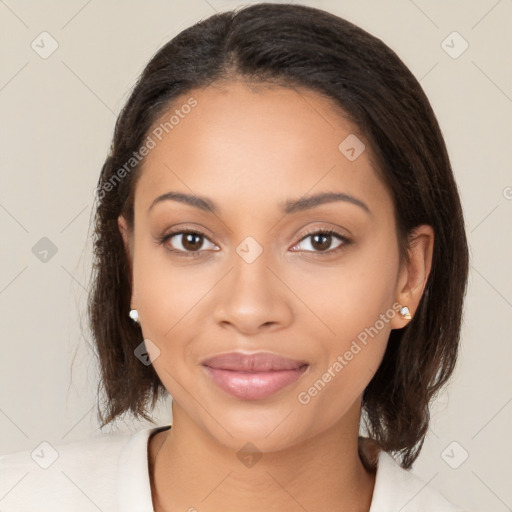 Joyful latino young-adult female with medium  brown hair and brown eyes