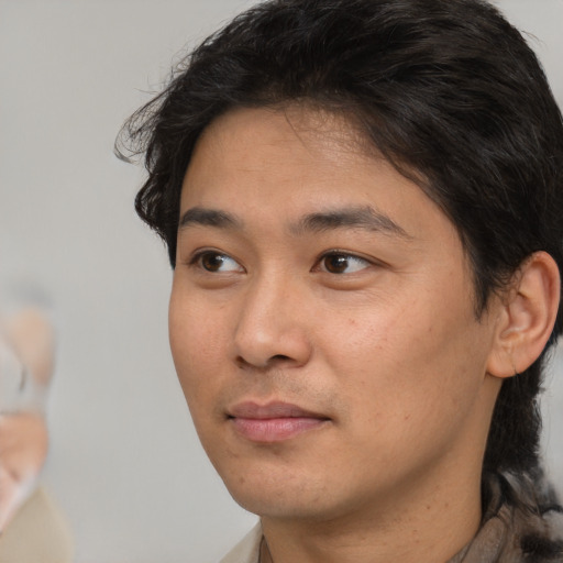 Neutral white young-adult male with medium  brown hair and brown eyes