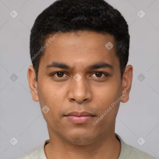 Neutral latino young-adult male with short  black hair and brown eyes