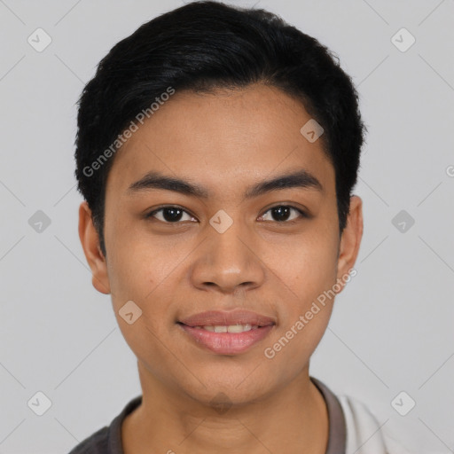 Joyful latino young-adult male with short  black hair and brown eyes