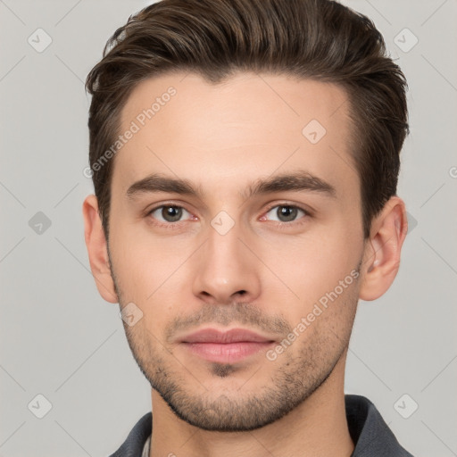 Neutral white young-adult male with short  brown hair and brown eyes