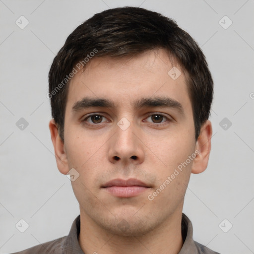 Neutral white young-adult male with short  brown hair and brown eyes