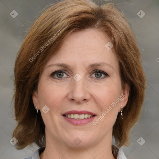 Joyful white adult female with medium  brown hair and grey eyes