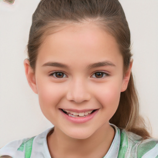 Joyful white child female with short  brown hair and brown eyes