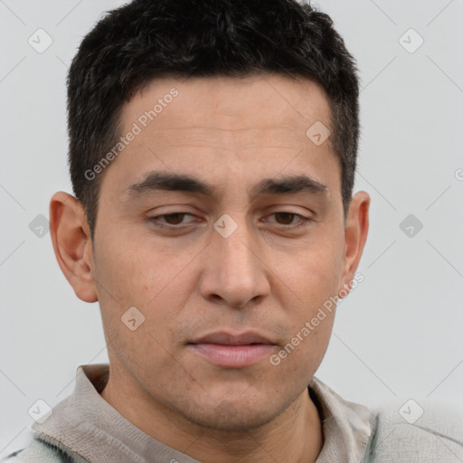 Joyful white adult male with short  brown hair and brown eyes