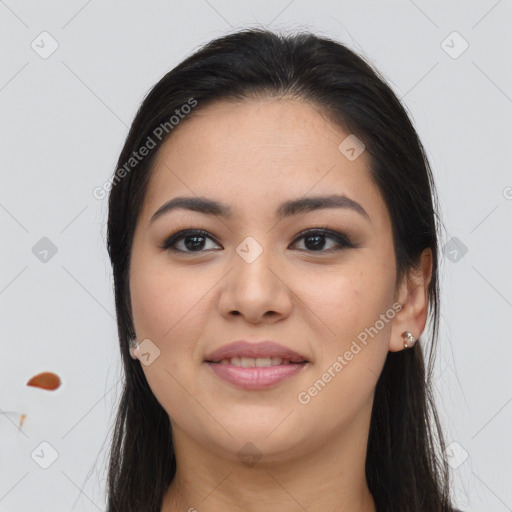 Joyful asian young-adult female with long  brown hair and brown eyes