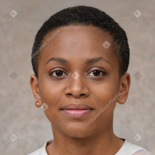 Joyful black young-adult female with short  brown hair and brown eyes