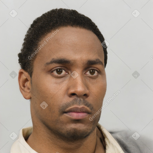 Neutral black young-adult male with short  brown hair and brown eyes